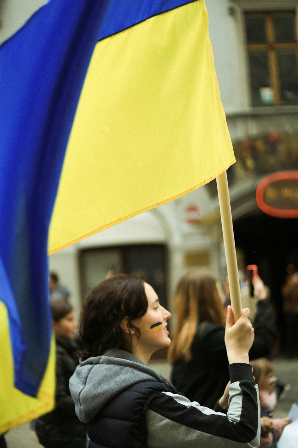 a woman holding a flag