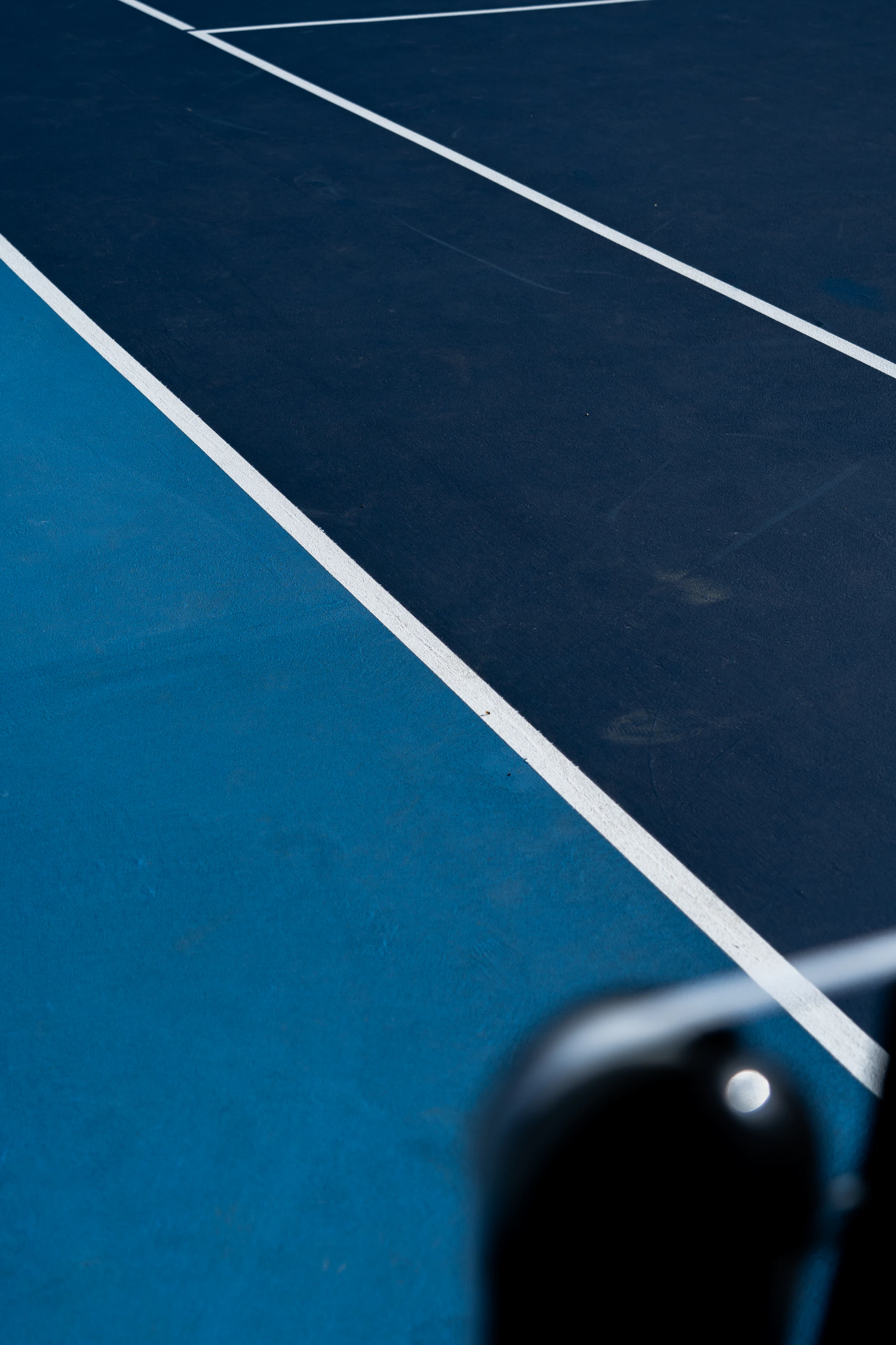a tennis court with a racket