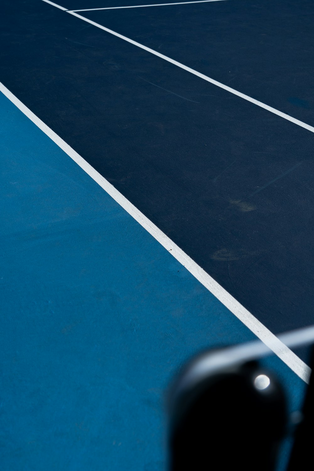 a tennis court with a racket