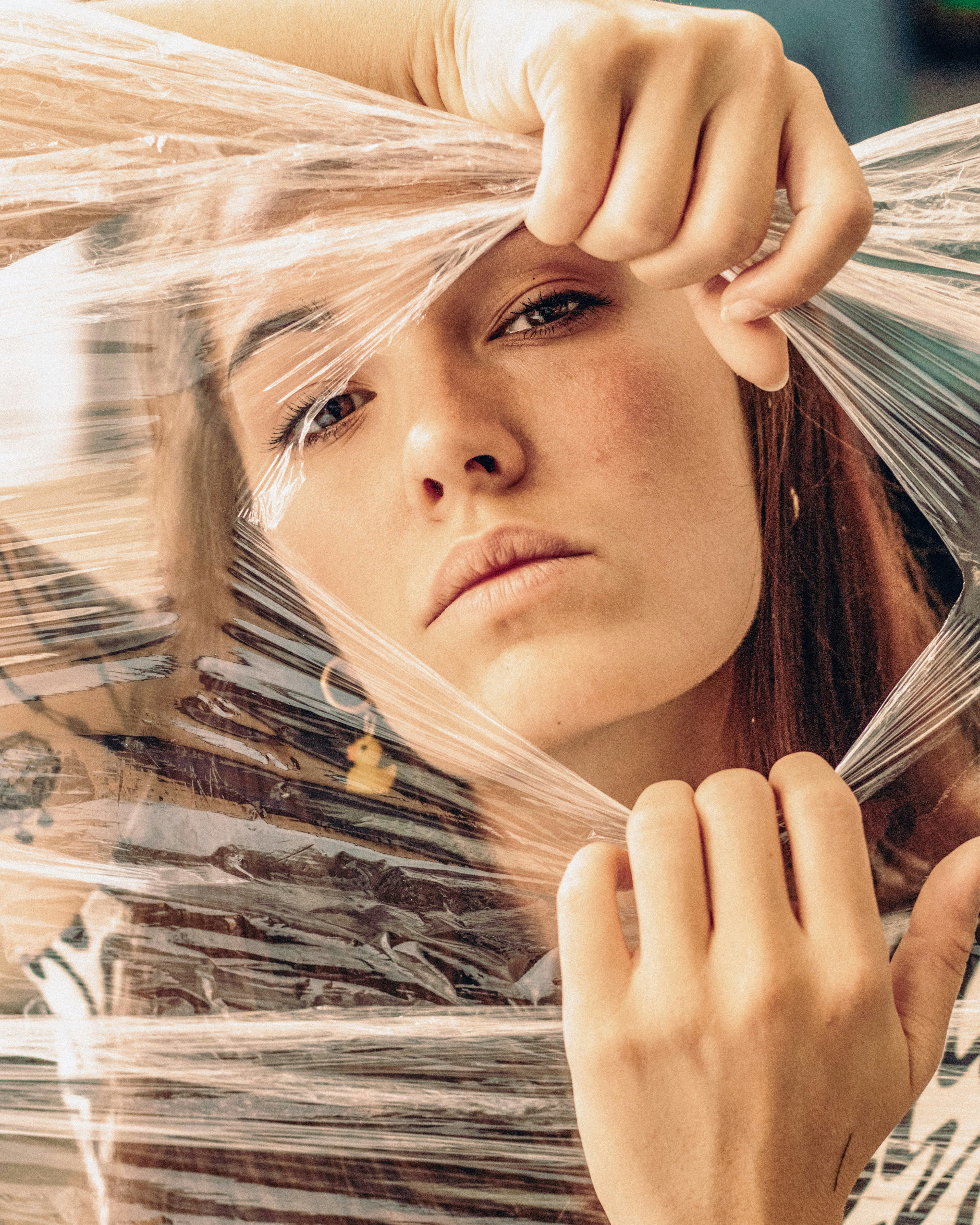 a woman with her hands on her head