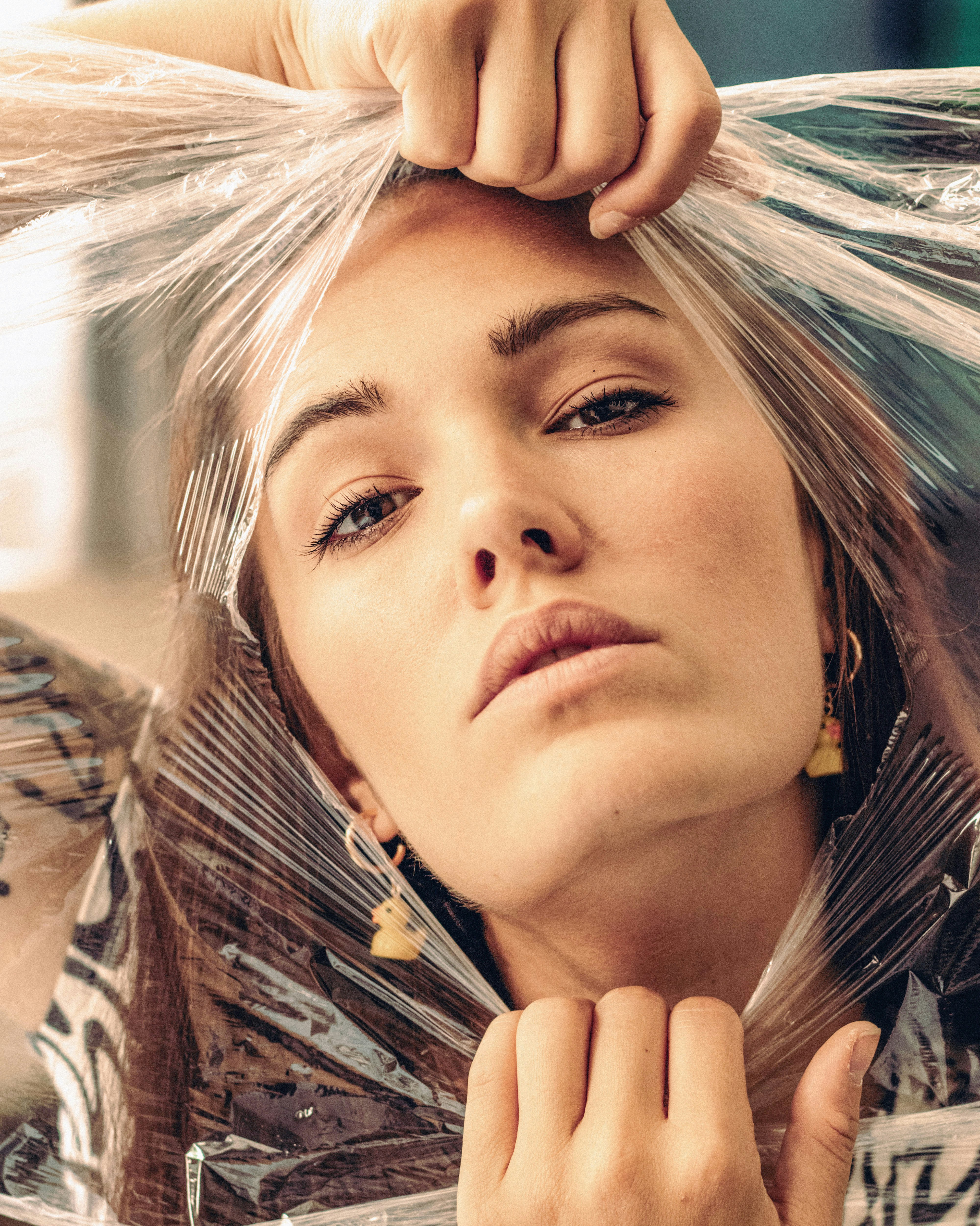 a woman with her hand on her head