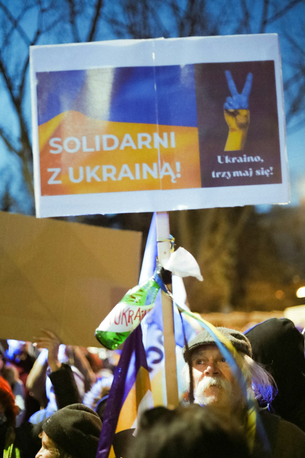 a person holding a sign