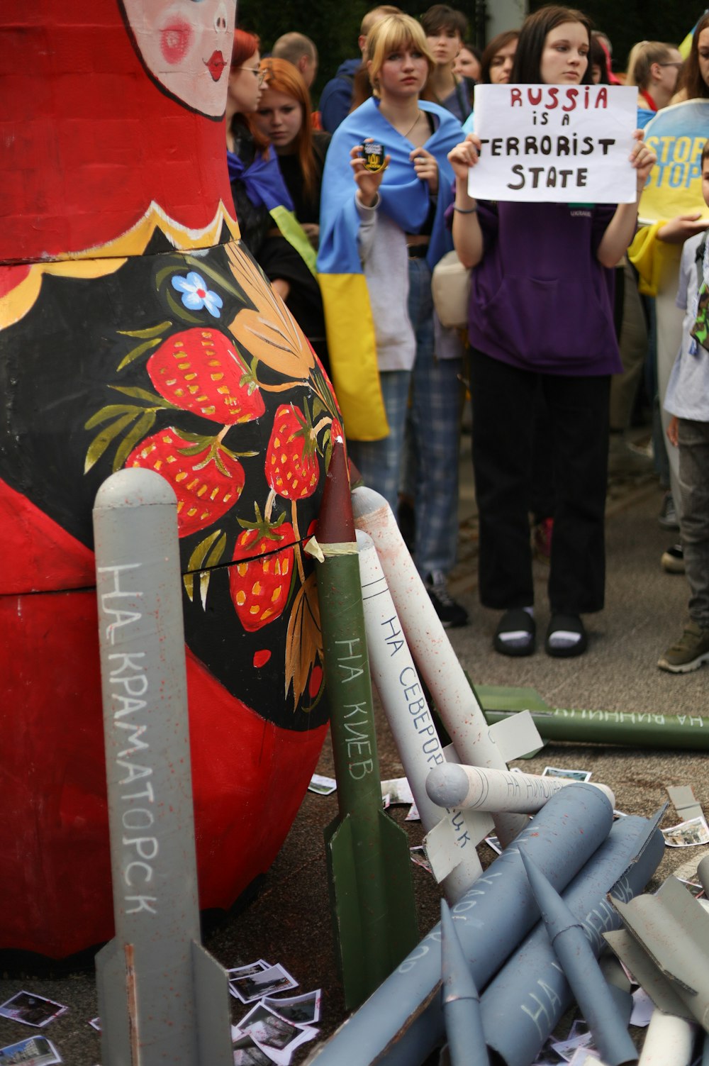 a group of people holding signs