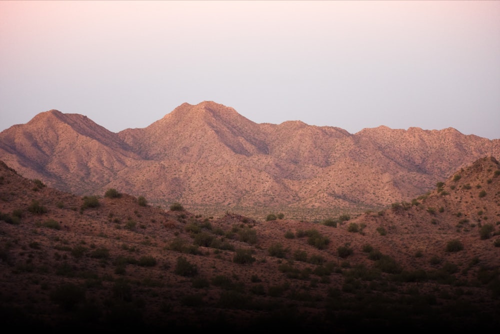 a desert landscape with hills