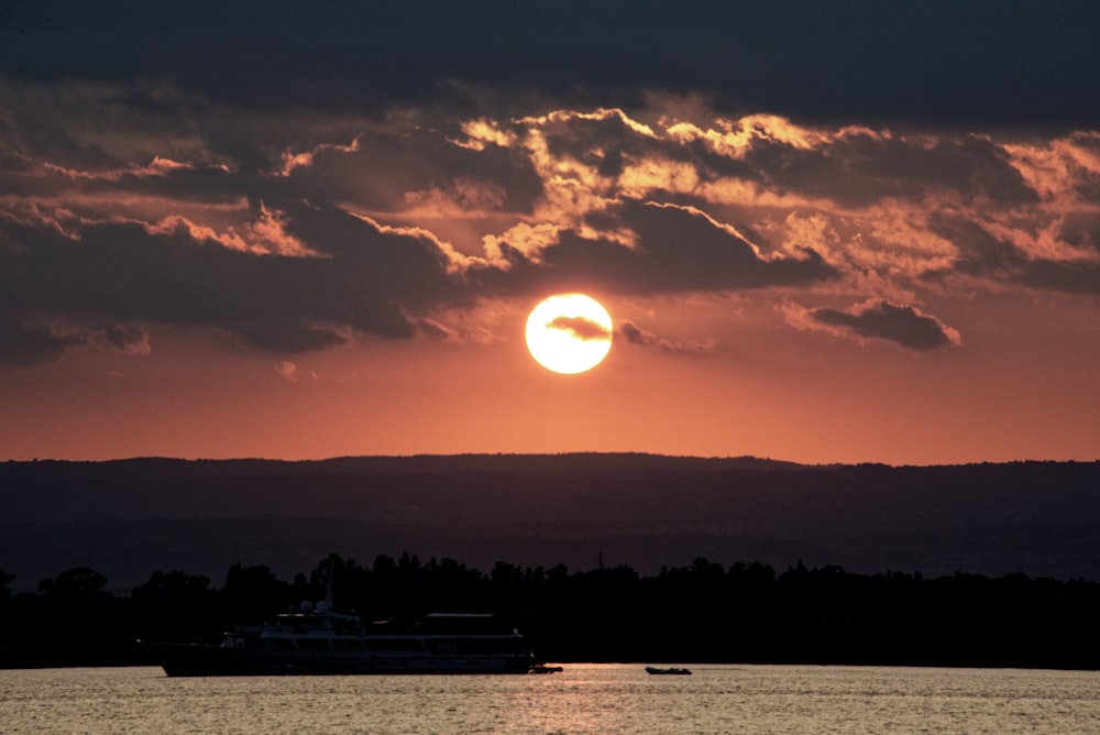 a sunset over a lake