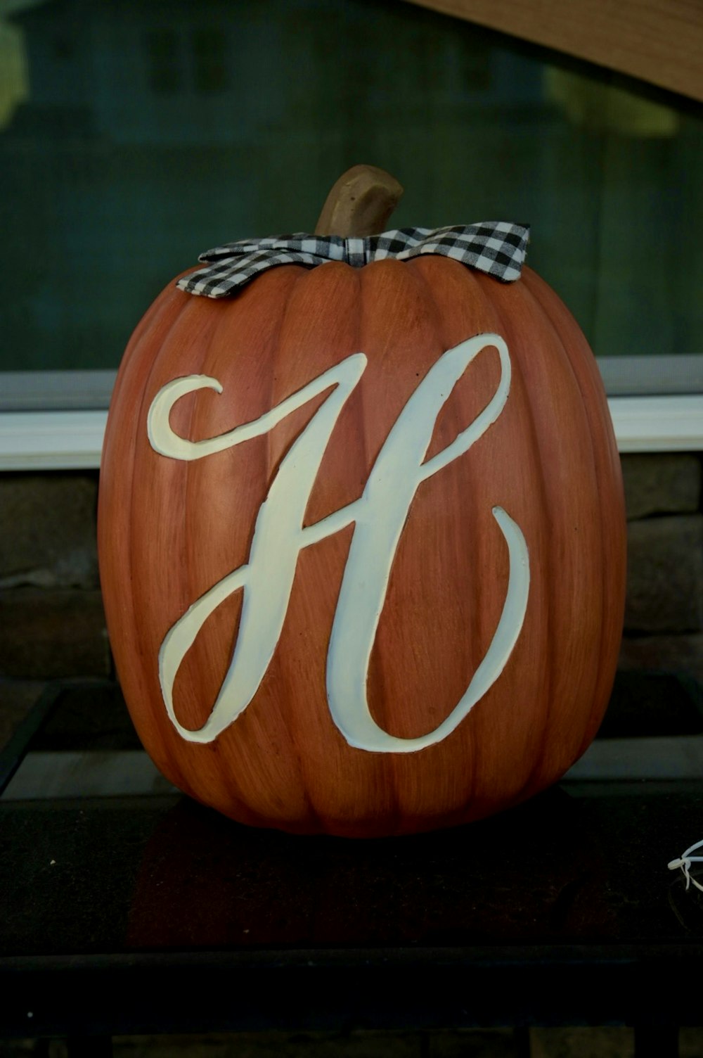a carved pumpkin with a string