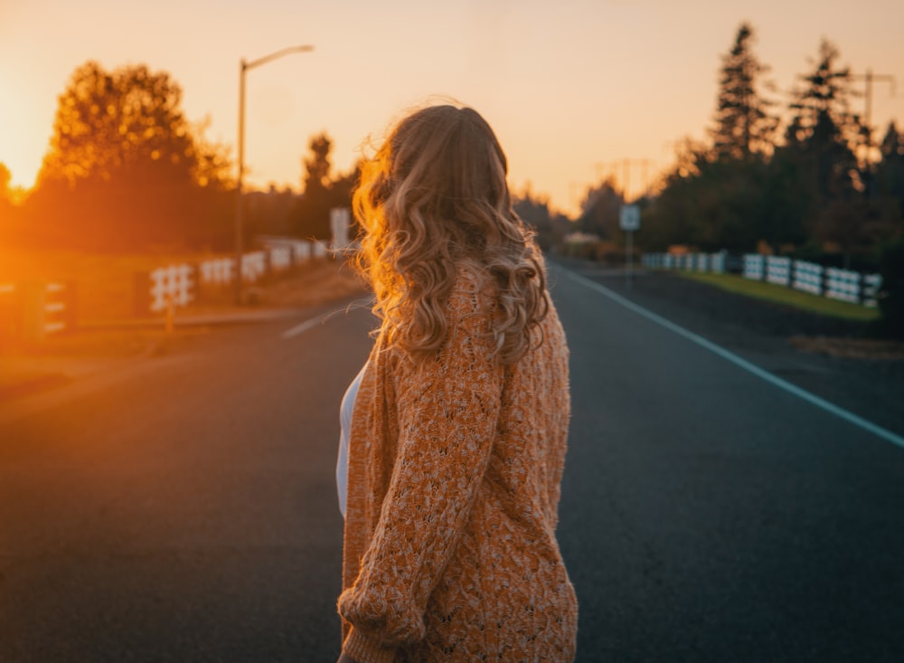 a person standing on a road