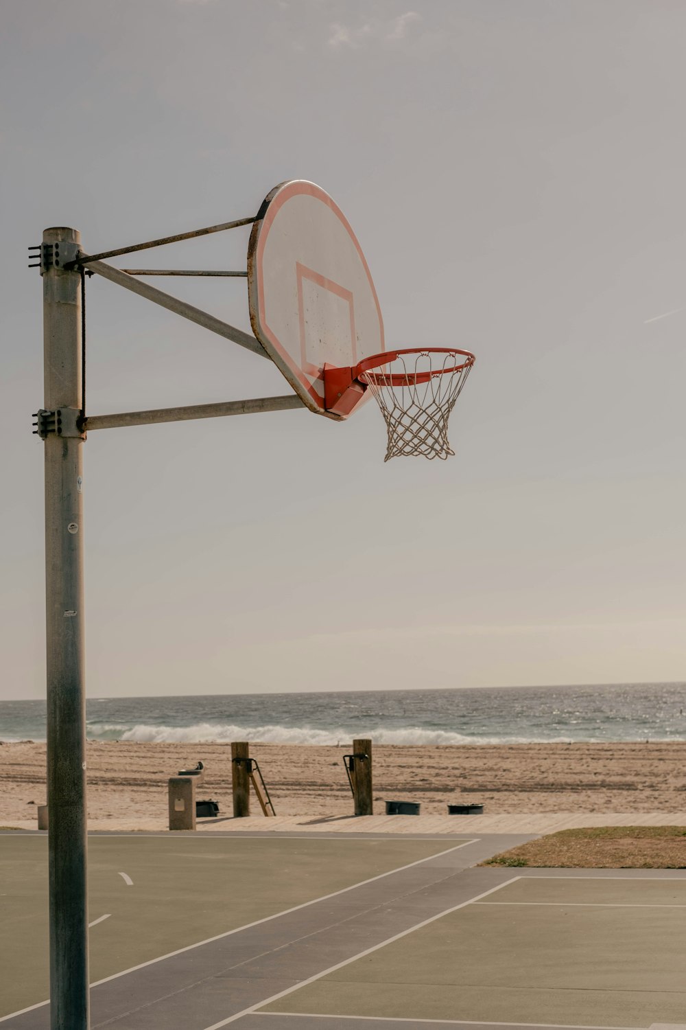 a basketball hoop on a beach
