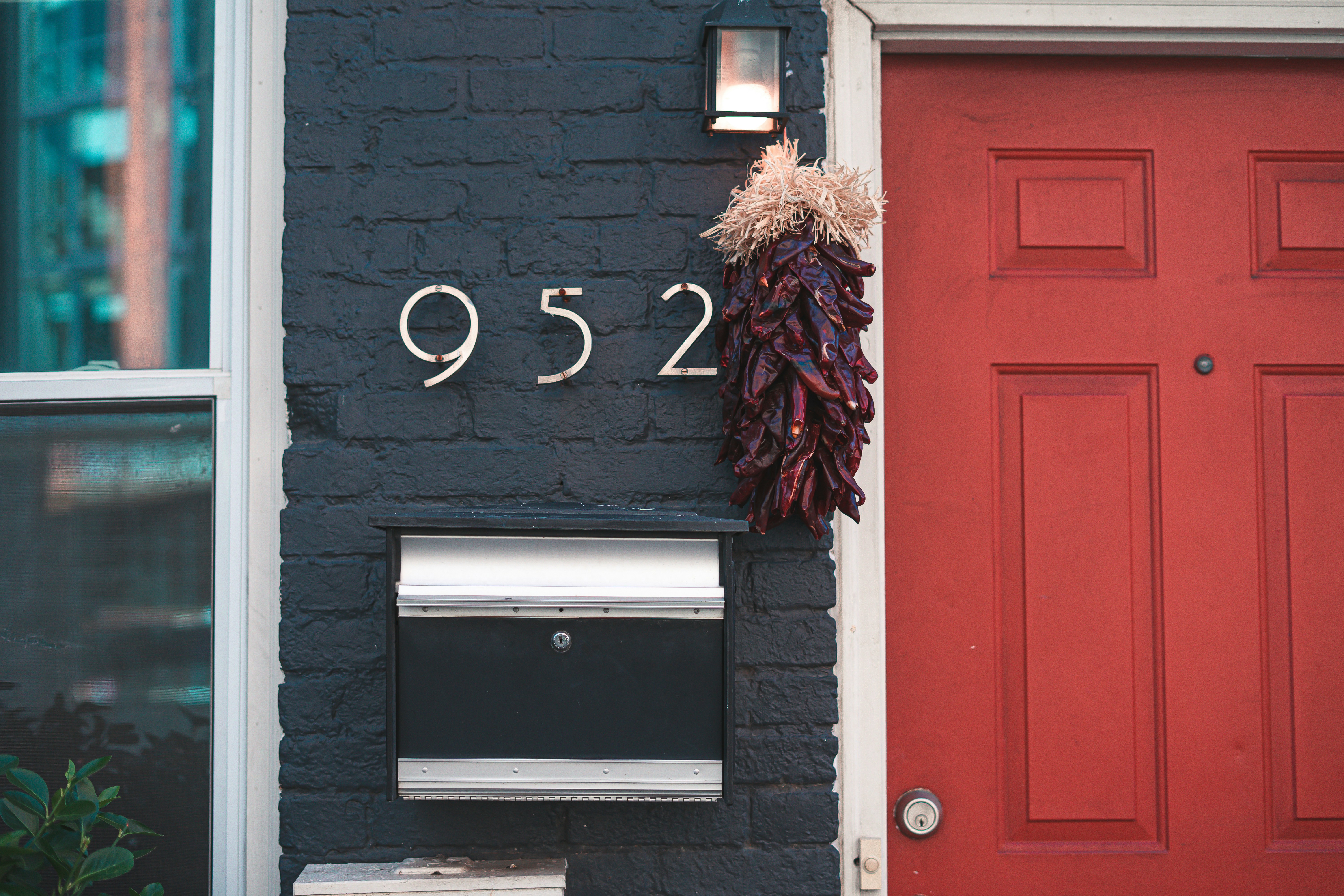 a door with a wreath from it