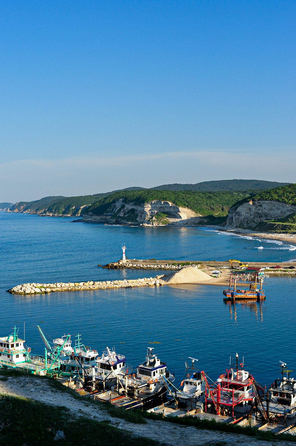 a group of boats in a bay