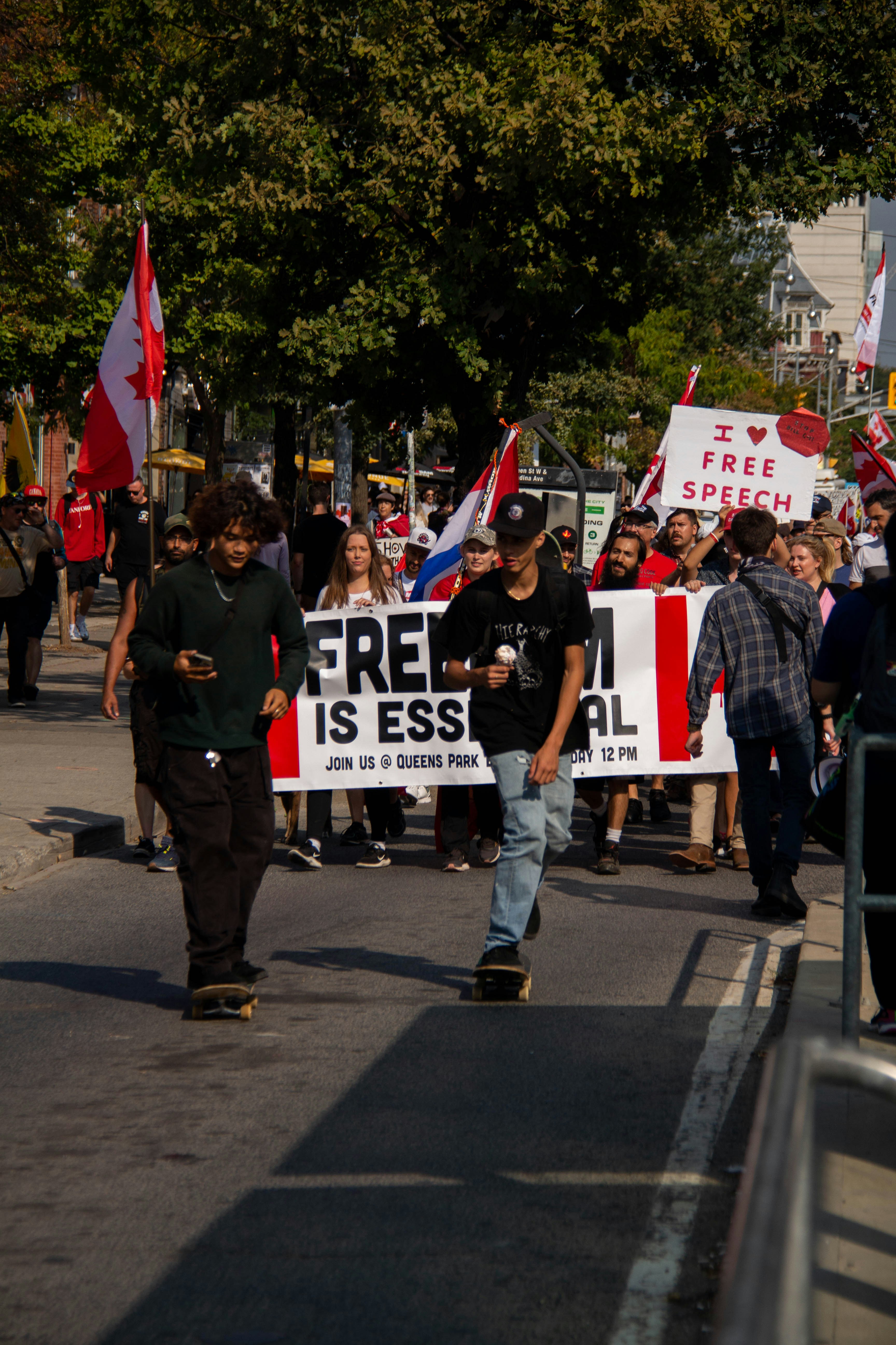 a group of people marching with signs