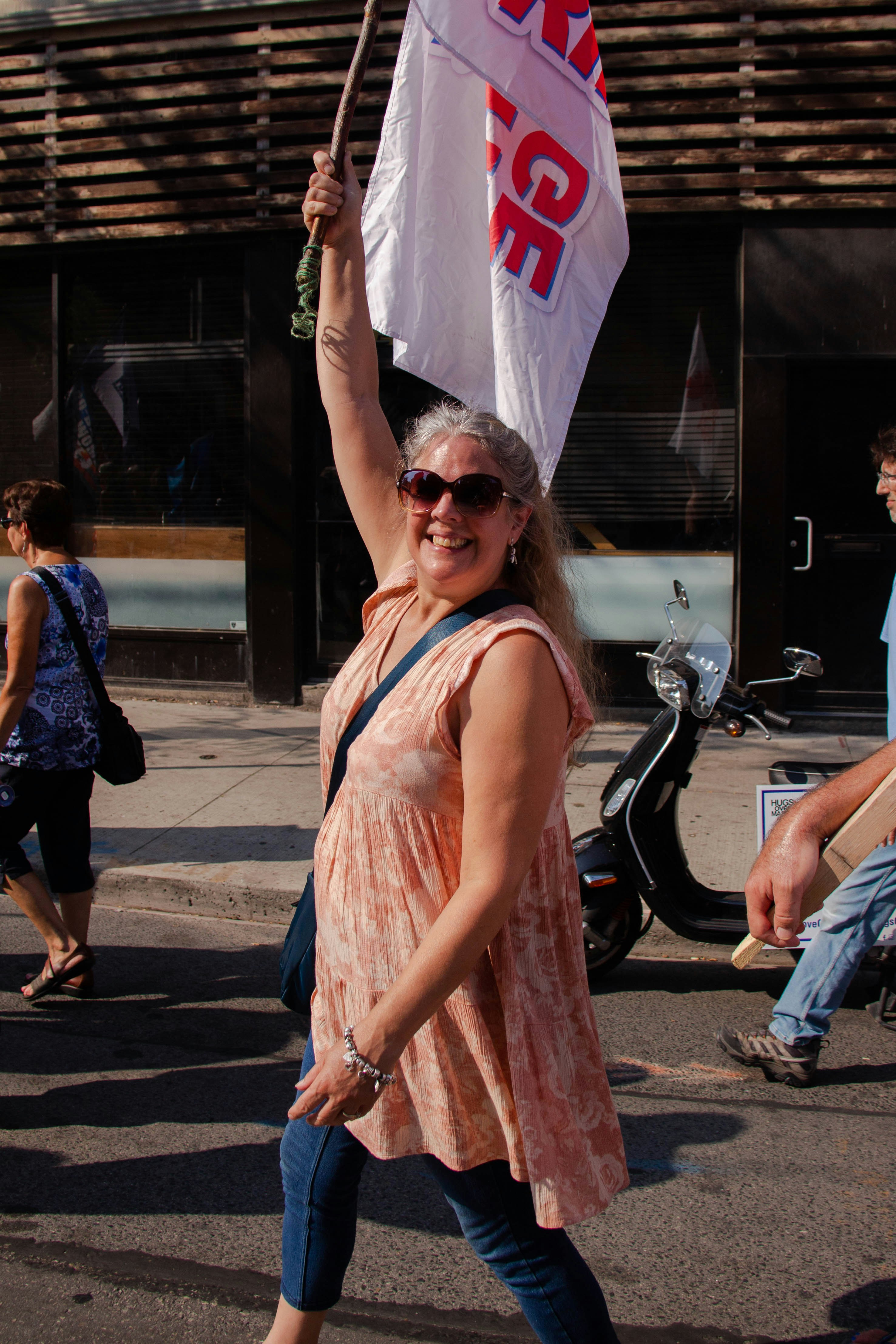 a person holding a flag