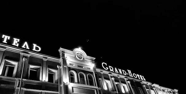 Minimalist black and white icon of a luxury hotel brand featured in noirvista's portfolio.