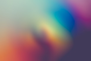 a blurry image of a rainbow