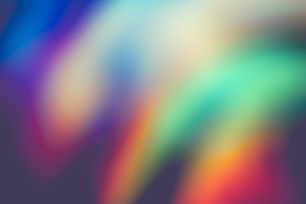 a blurry image of a rainbow