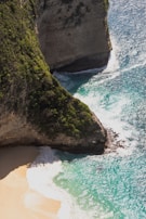 An aerial shot of a beautiful coastline.