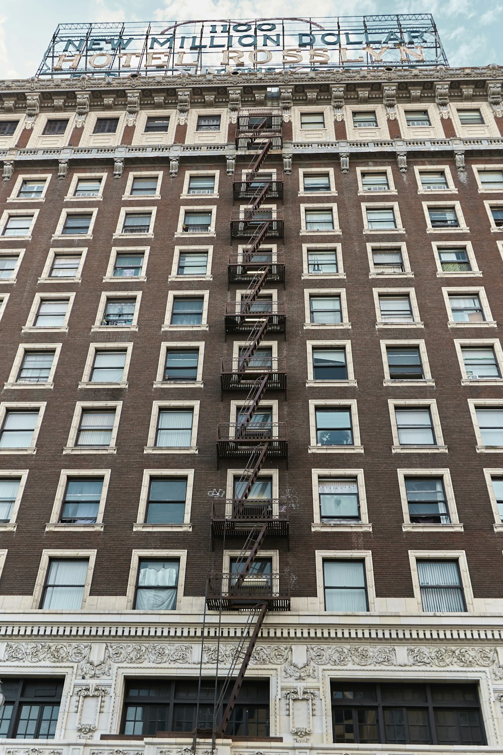 a tall building with a ladder on the side