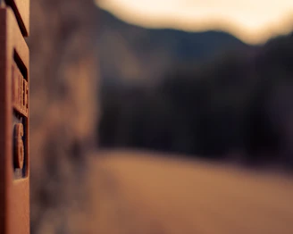 Close-up of a guest sharing insights, with a subtle trucker stop sign blurred in the background.