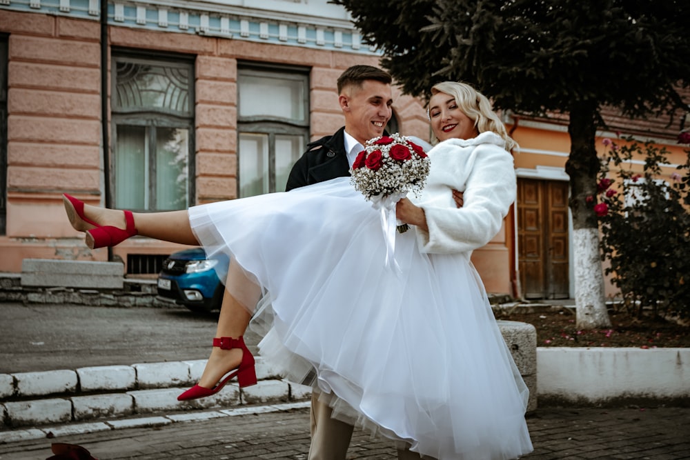 a man and woman in wedding attire