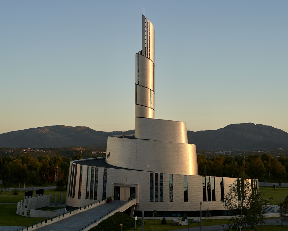 a large white building with a tower