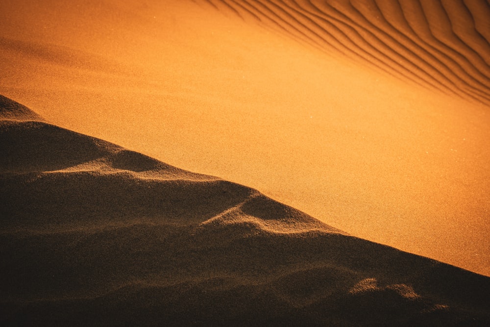 a desert landscape with sand dunes