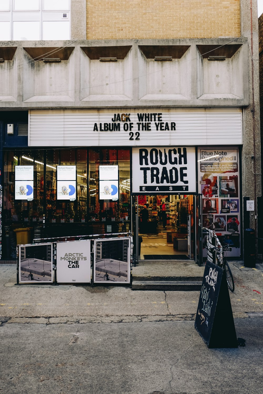 a store front with signs