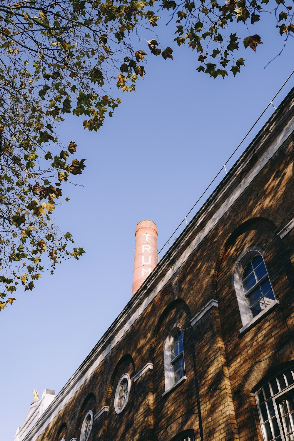 a brick building with a chimney