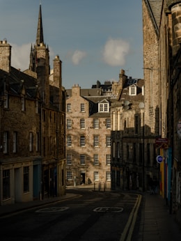 A quiet street corner in Prague bathed in soft morning light, capturing the city's timeless atmosphere in black and white.