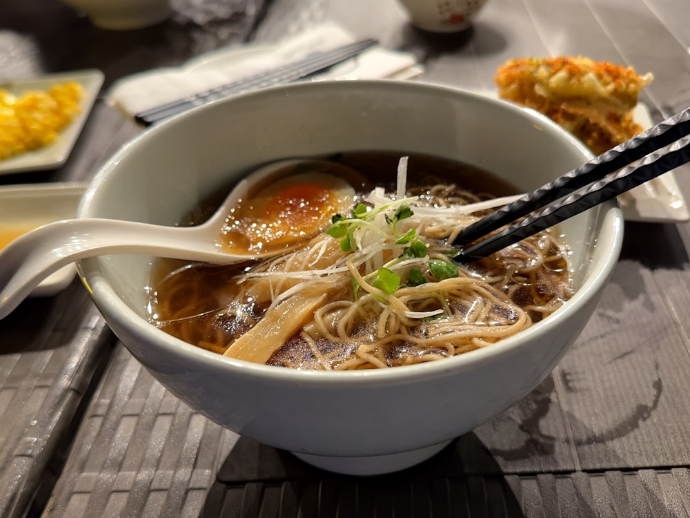 a bowl of soup with a spoon