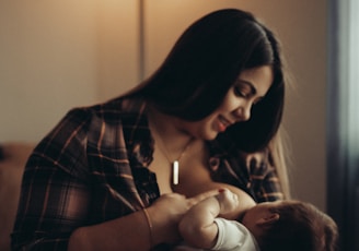 a person holding a baby