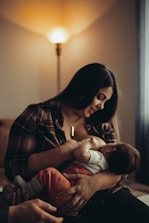 a person holding a baby