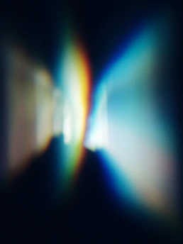 a blurry image of a rainbow
