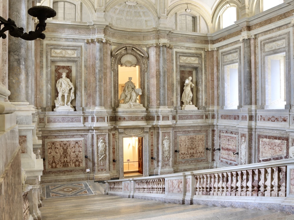 a large ornate building with statues