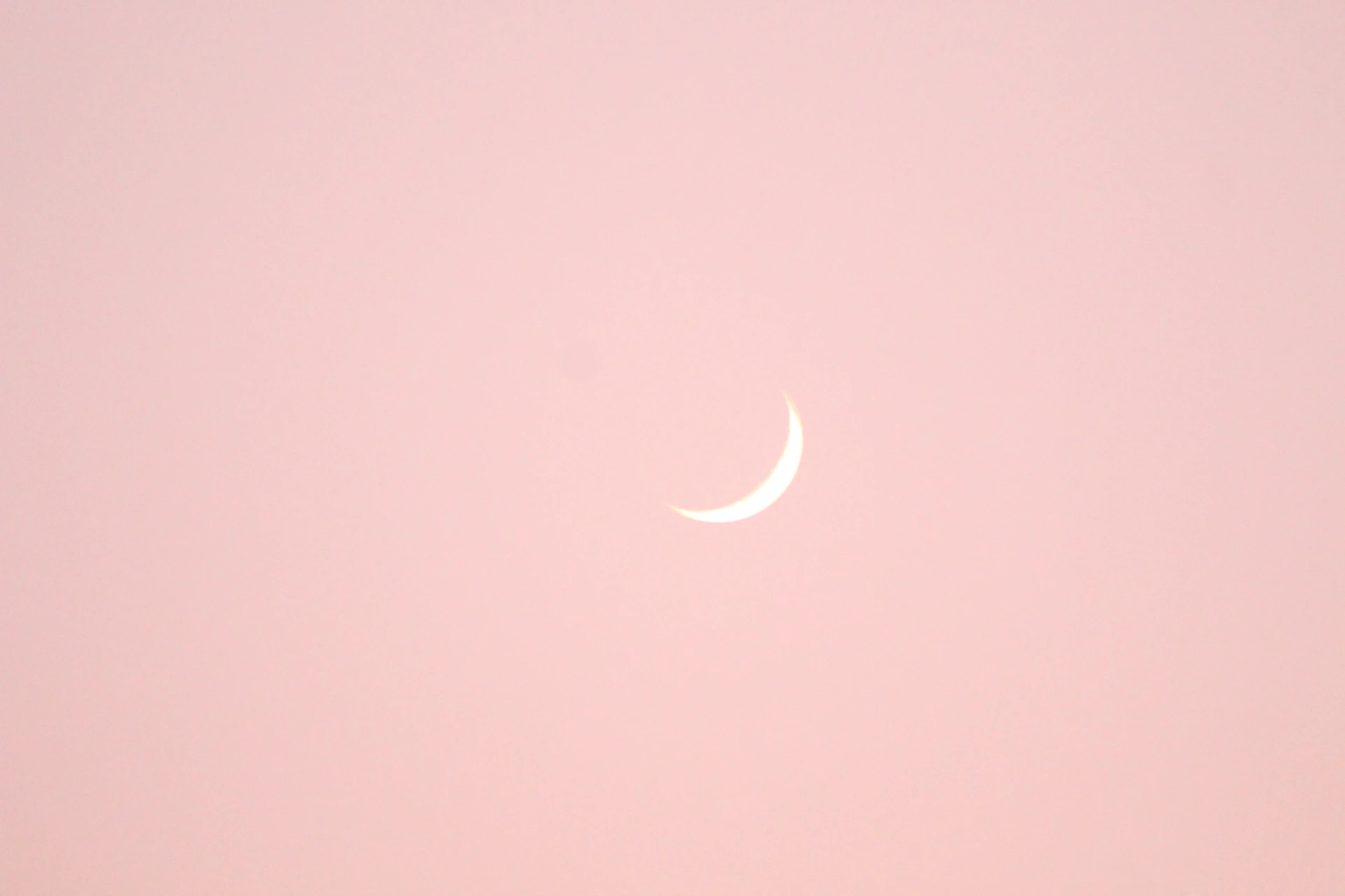 a crescent moon in the sky