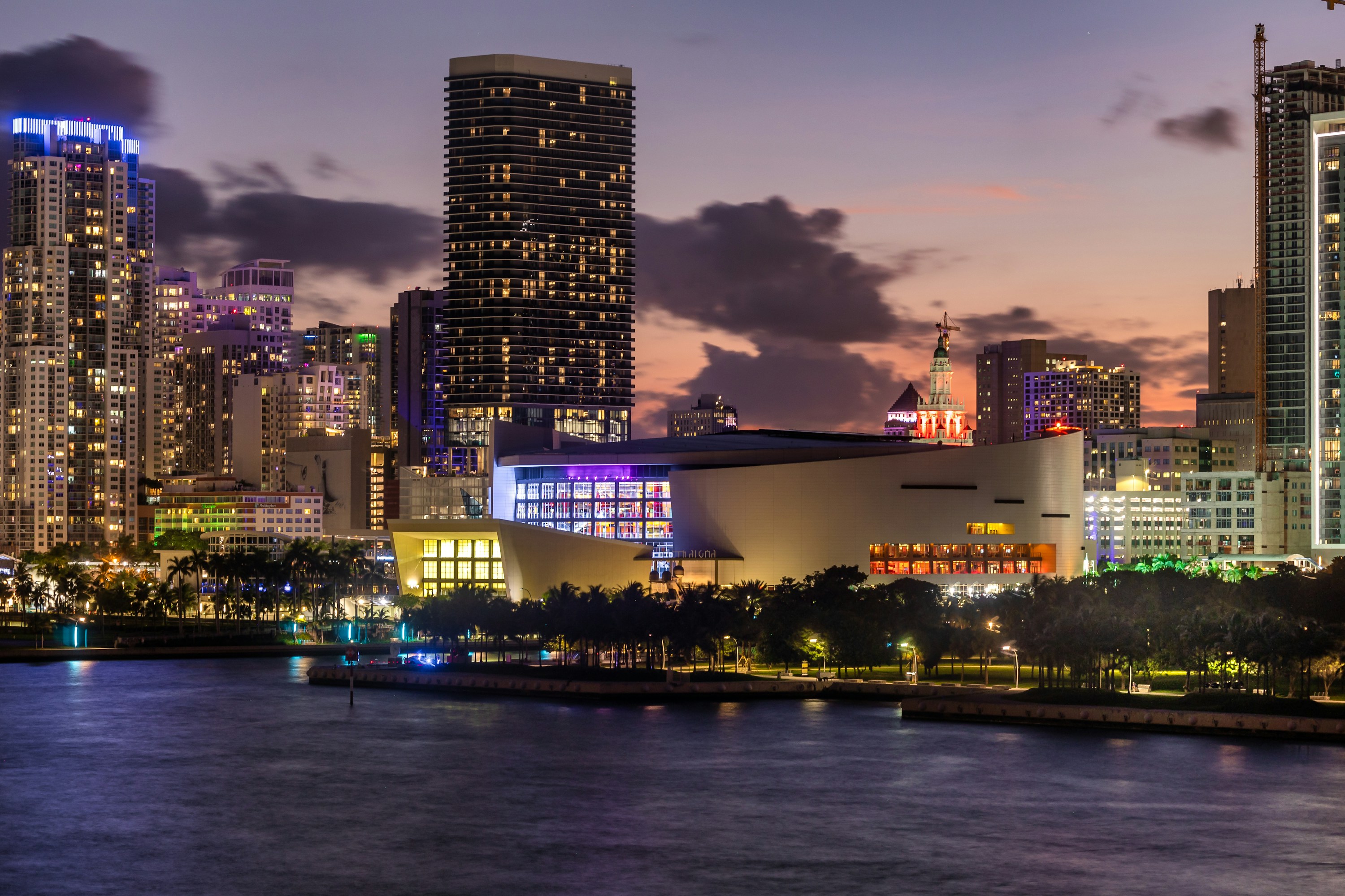 Kaseya Center on Biscayne Bay with the downtown Miami skyline at night