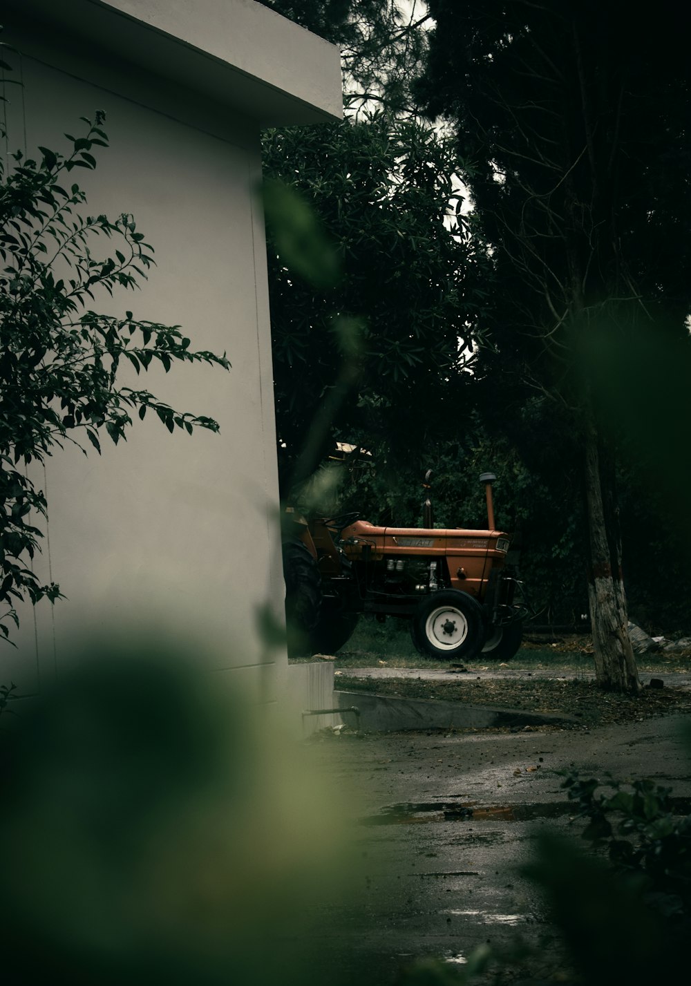 a tractor parked in a driveway