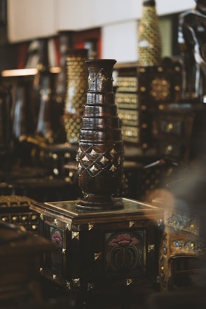 a gold and black trophy