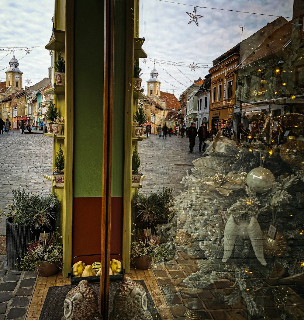 a street with buildings and people