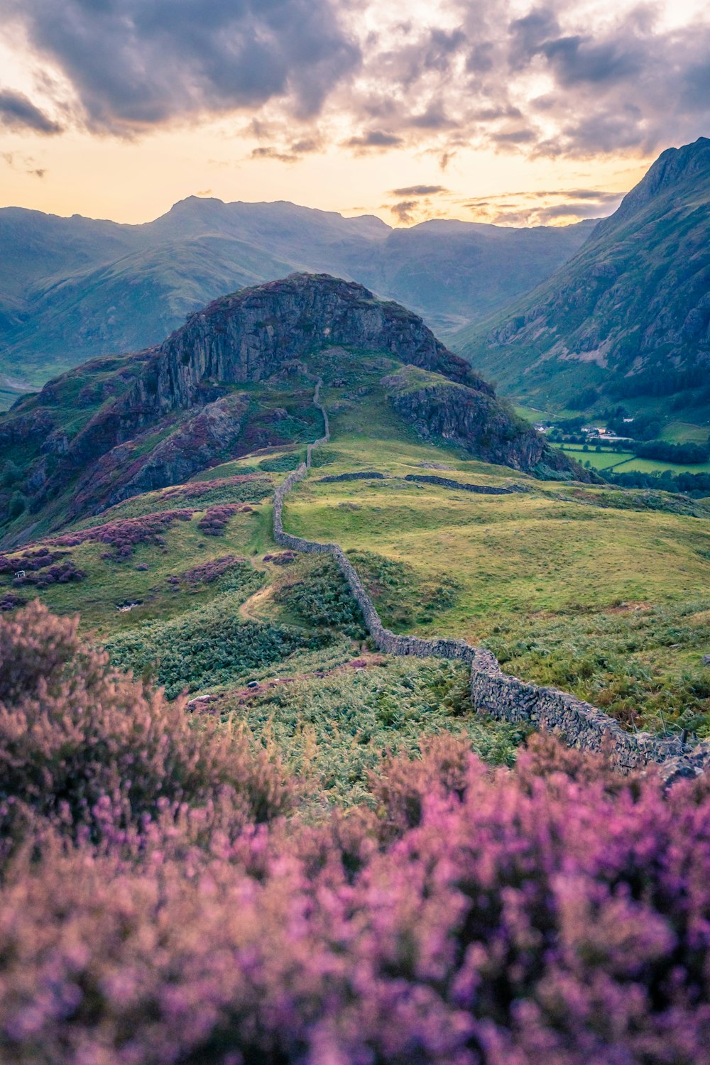 a winding road through a valley