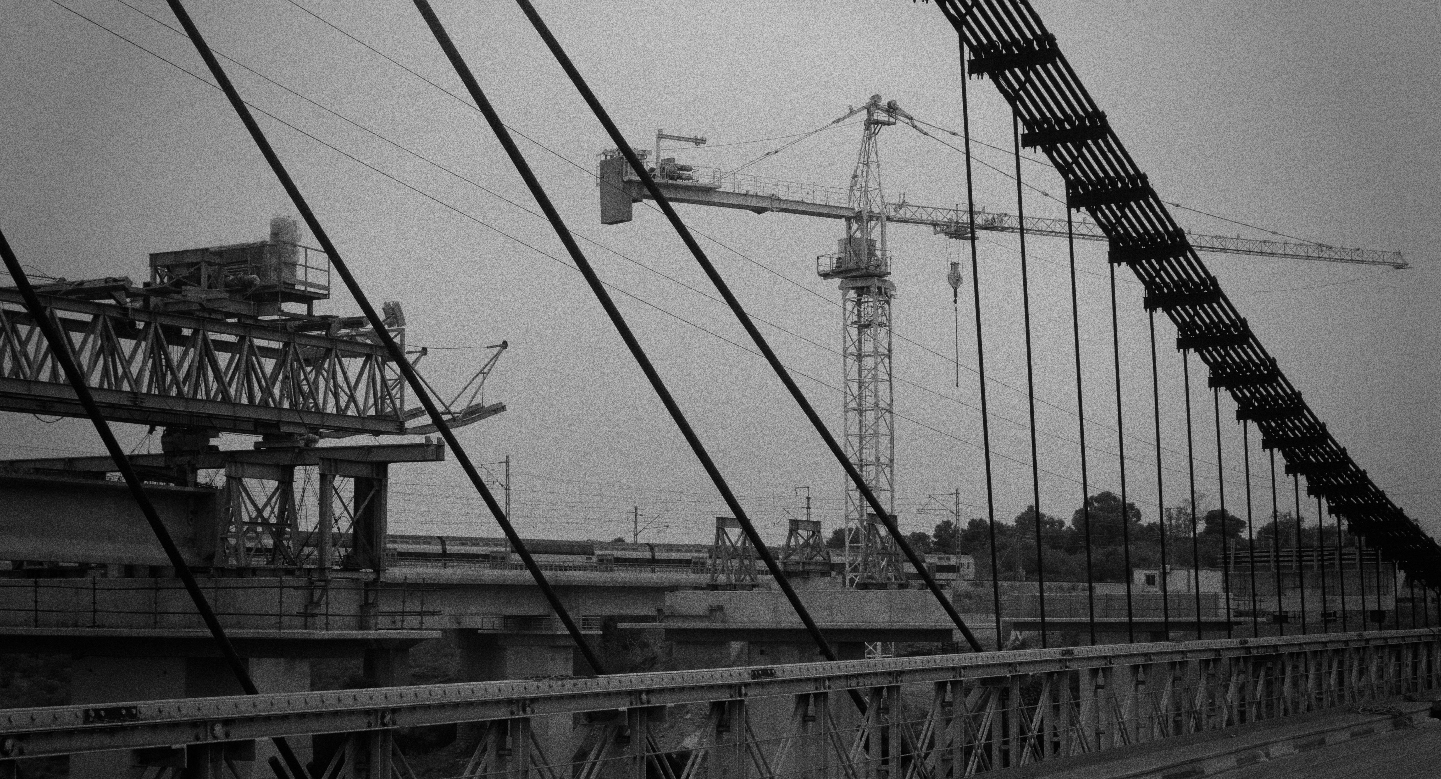crumbling art deco facade eaten by neon signs