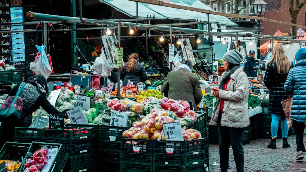 people shopping at a market