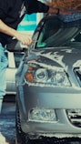 a person washing a car