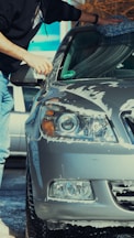 a person washing a car