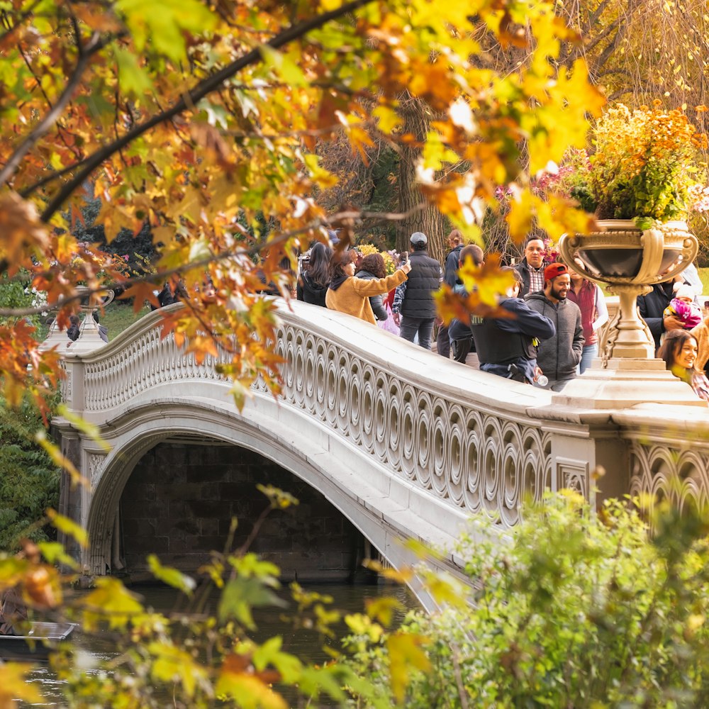 a group of people on a bridge