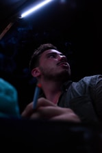 Photo of a person looking thoughtful, symbolizing the struggle with addiction.