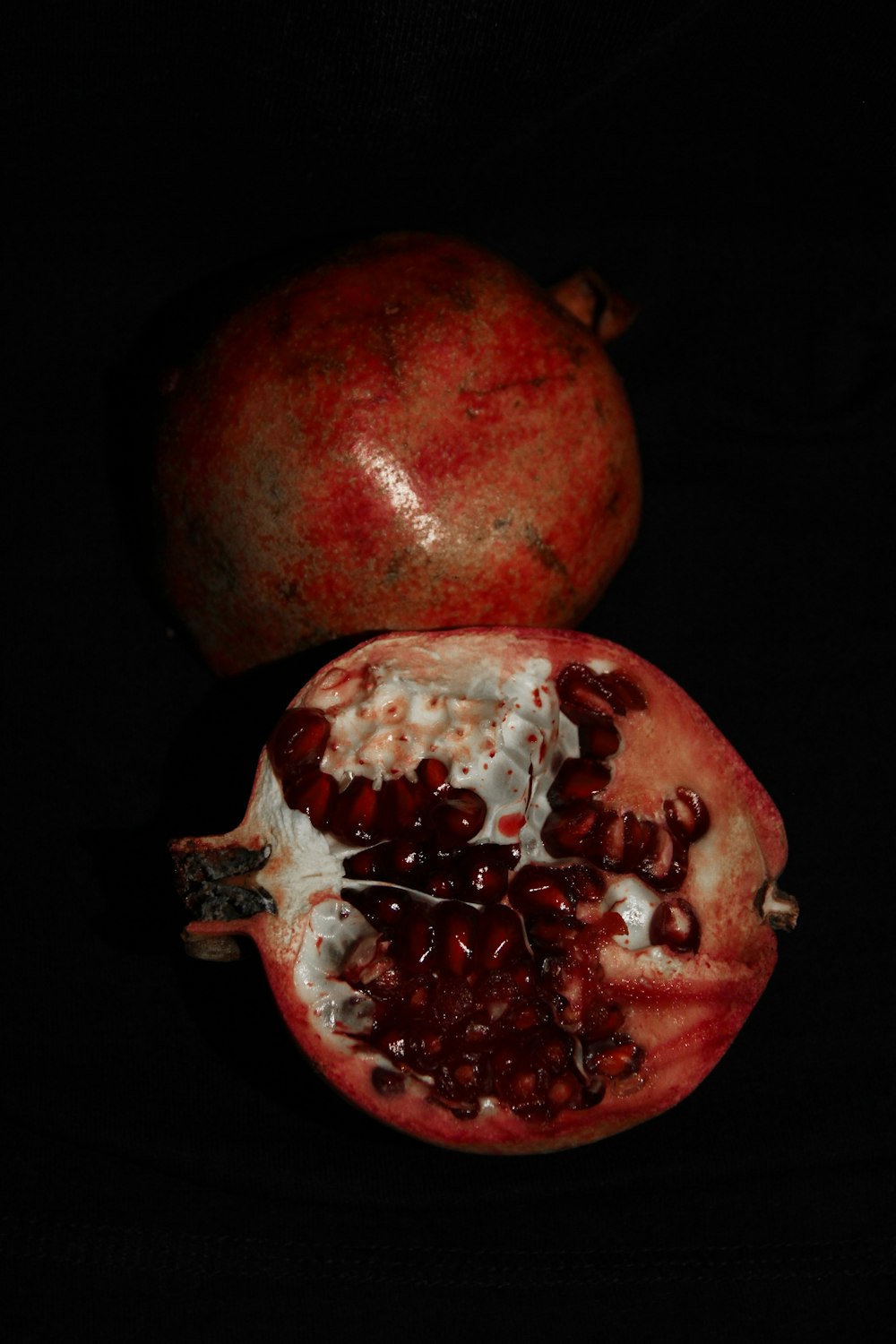 a pair of pomegranates