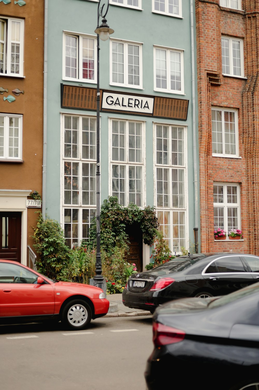 cars parked in front of a building