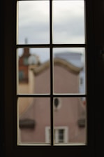 a window with a view of a city