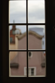 a window with a view of a city