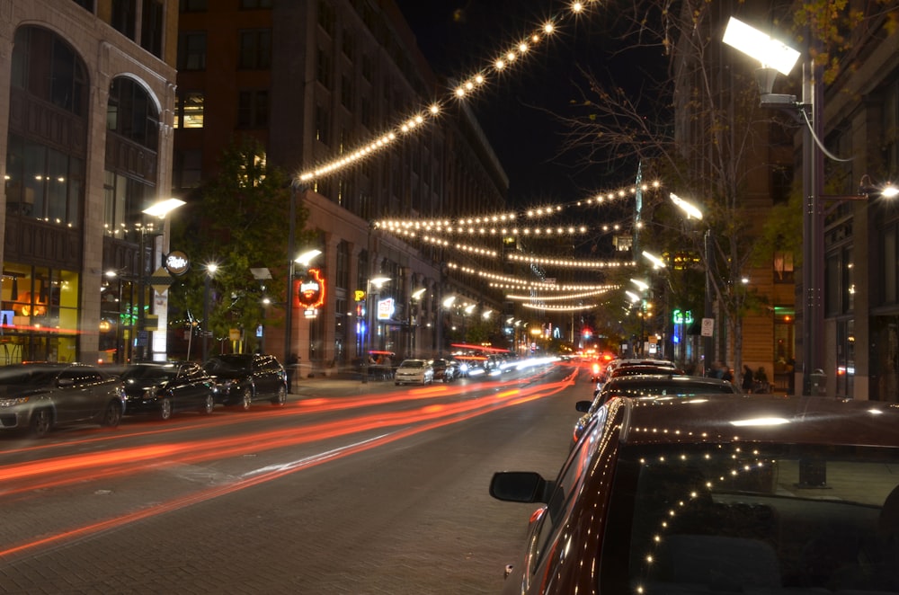 a street with cars and buildings on either side of it